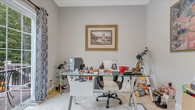 a view of a garage with rack and bicycle