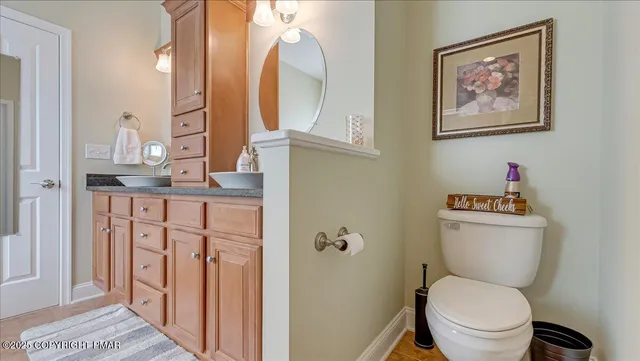 a view of a chairs and table in the balcony