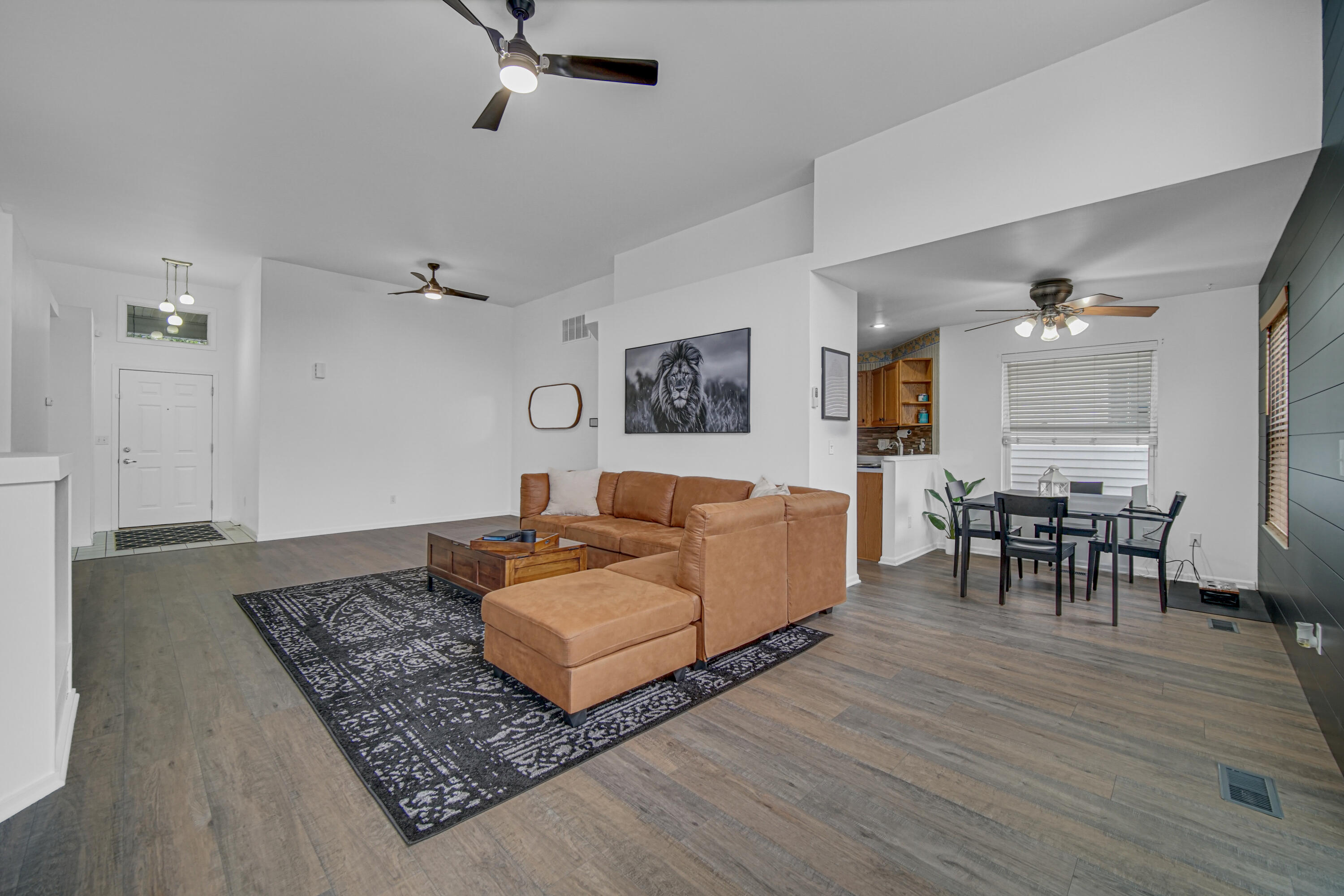 11130 Allendale Court Crown Point, IN 46307 - Photo 10 of 21 a living room with furniture and a wooden floor