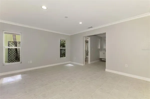 an empty room with a bathroom