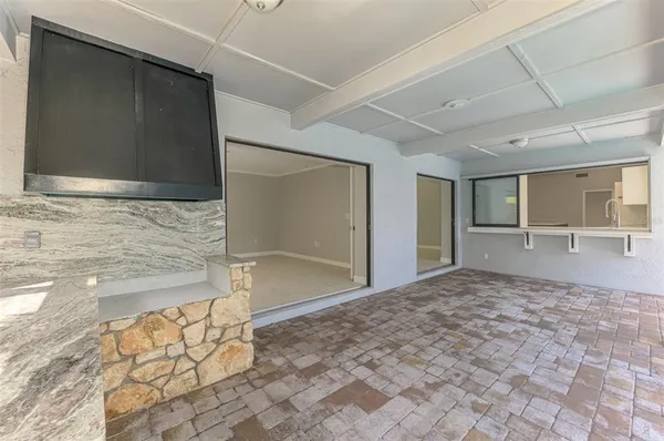 a view of a backyard with a garden and plants