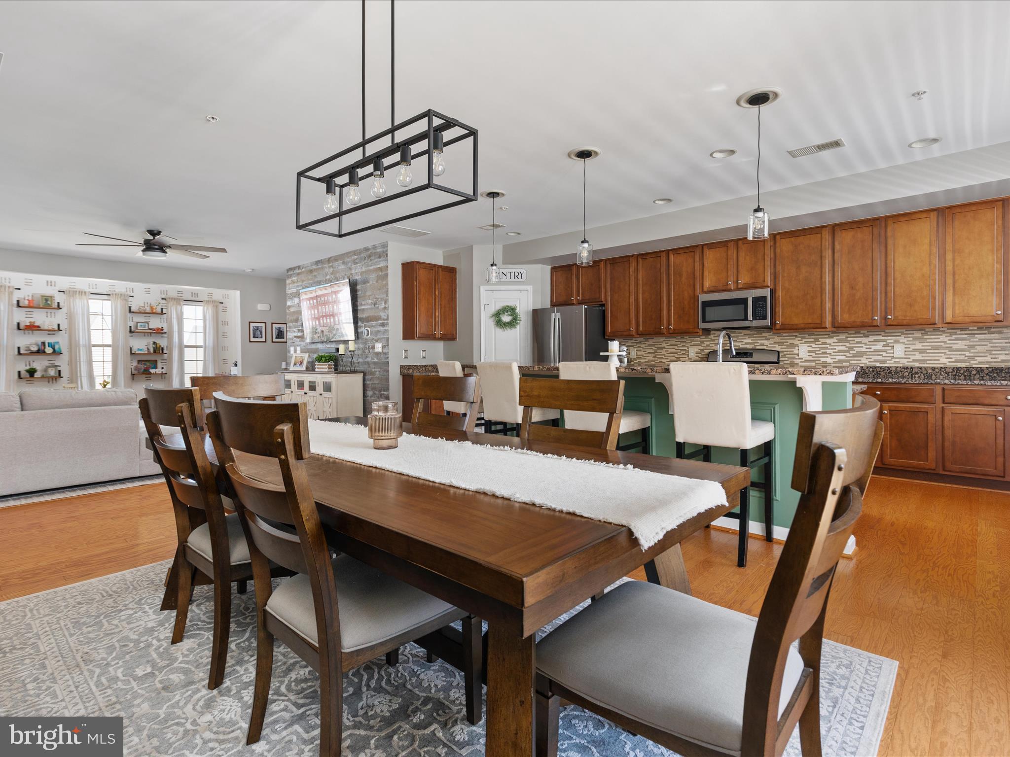 7734 Cedar Branch Drive Gainesville, VA 20155 - Photo 11 of 62 a view of a dining room with furniture