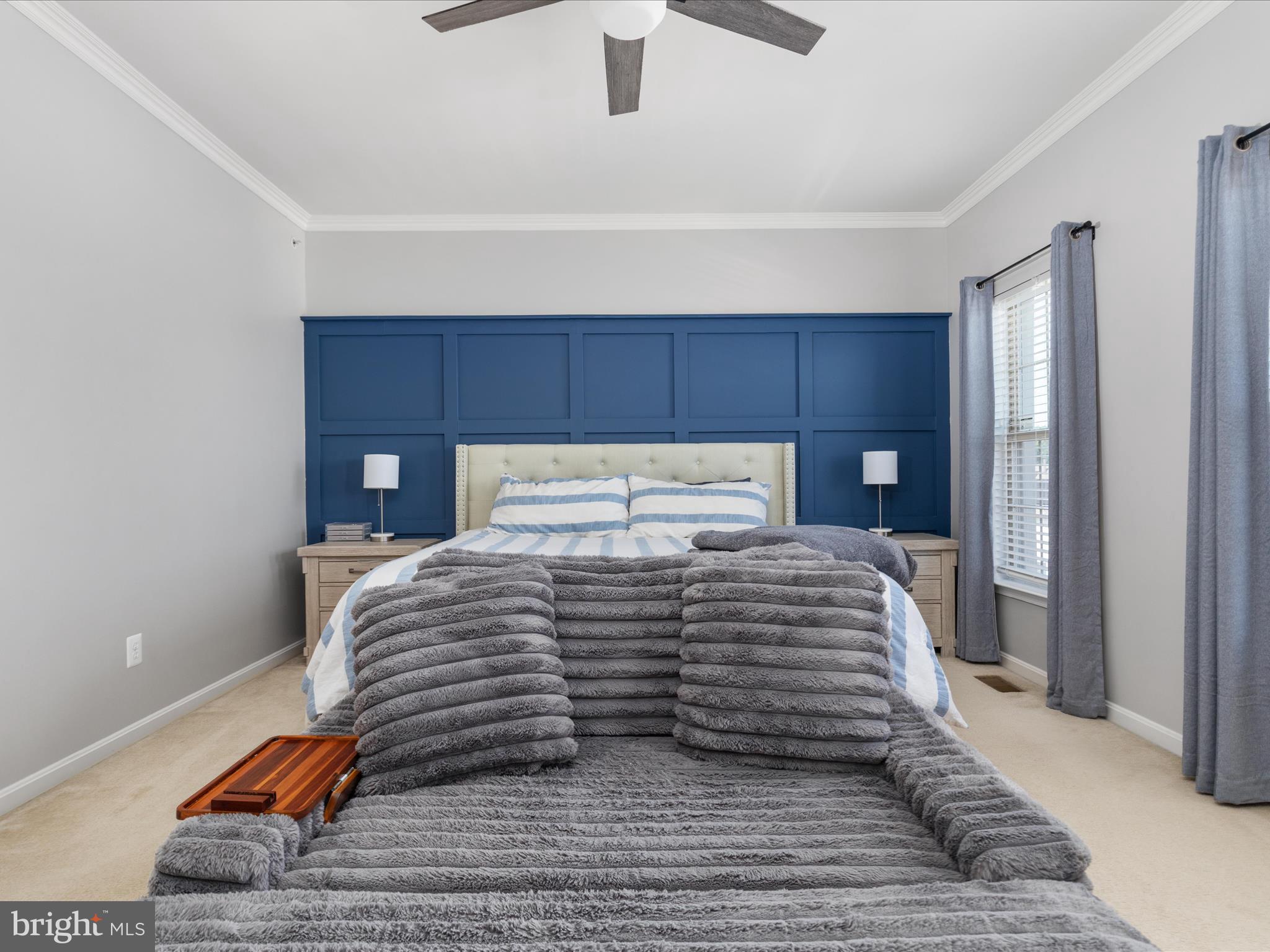 7734 Cedar Branch Drive Gainesville, VA 20155 - Photo 16 of 62 a bedroom with a bed and wooden floor