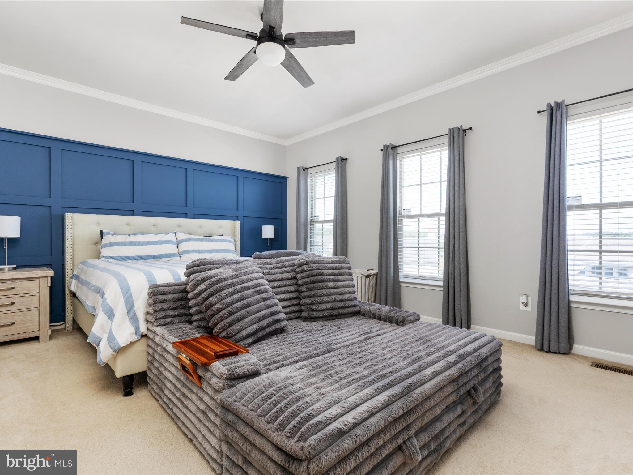 7734 Cedar Branch Drive Gainesville, VA 20155 - Photo 17 of 62 a bedroom with a bed and wooden floor