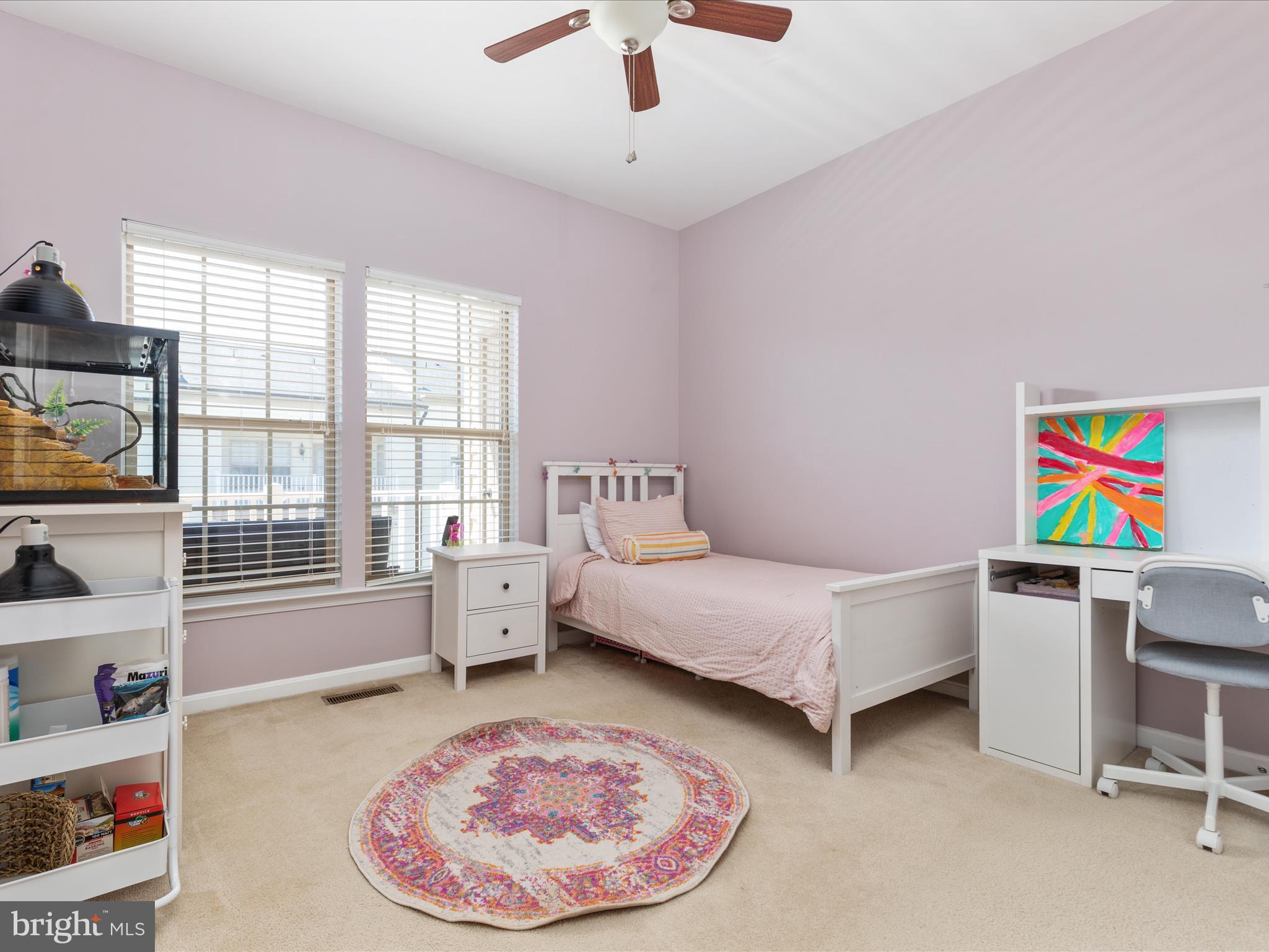 7734 Cedar Branch Drive Gainesville, VA 20155 - Photo 24 of 62 a living room with furniture and a flat screen tv