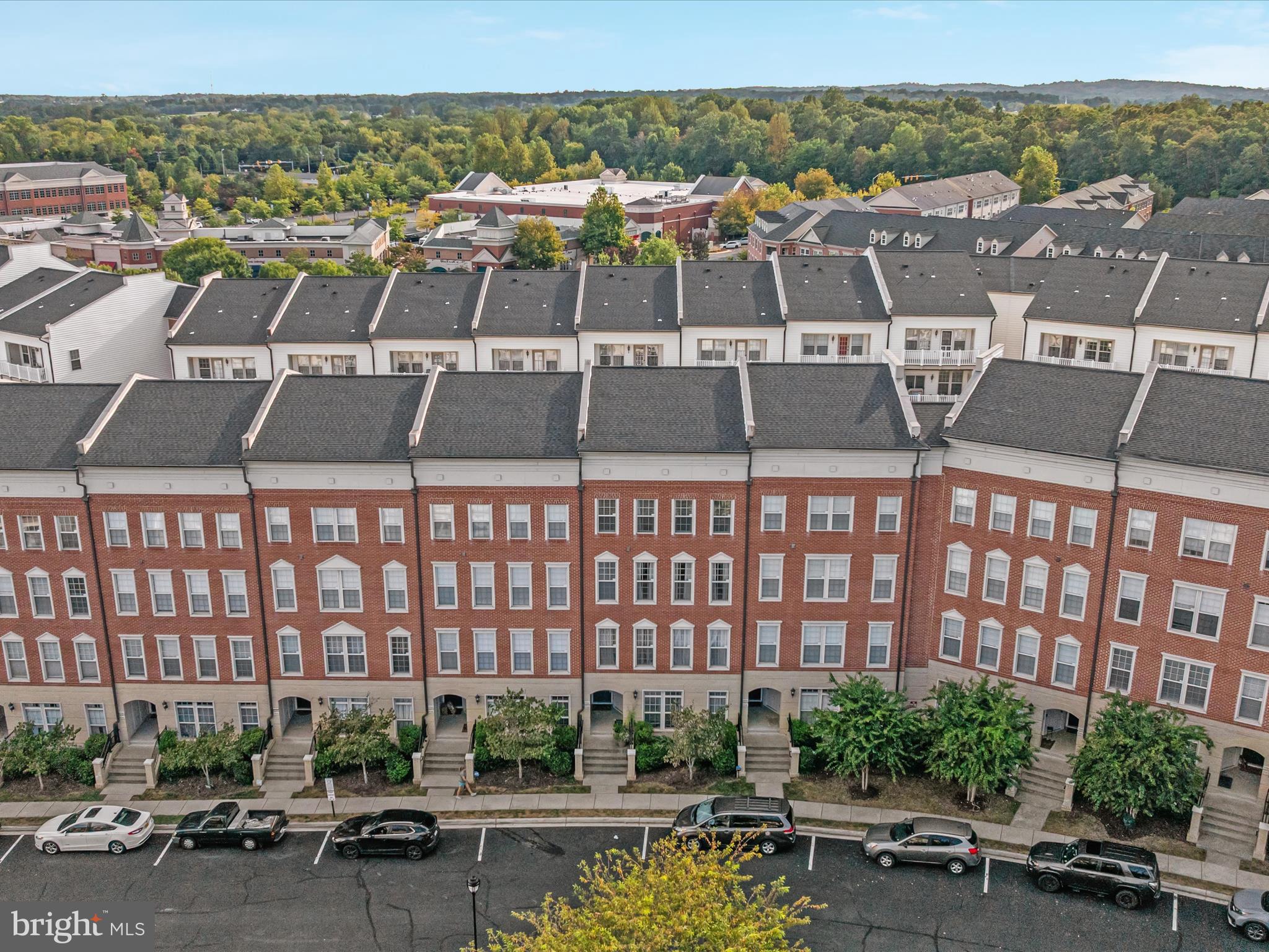 7734 Cedar Branch Drive Gainesville, VA 20155 - Photo 45 of 62 a view of a city with tall buildings