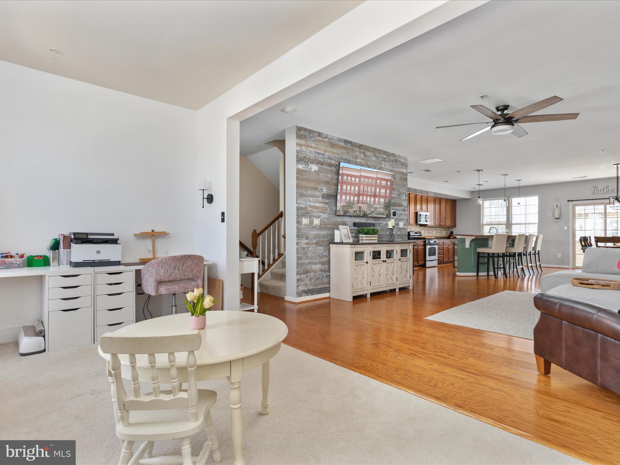 7734 Cedar Branch Drive Gainesville, VA 20155 - Photo 5 of 62 a living room with furniture and kitchen view