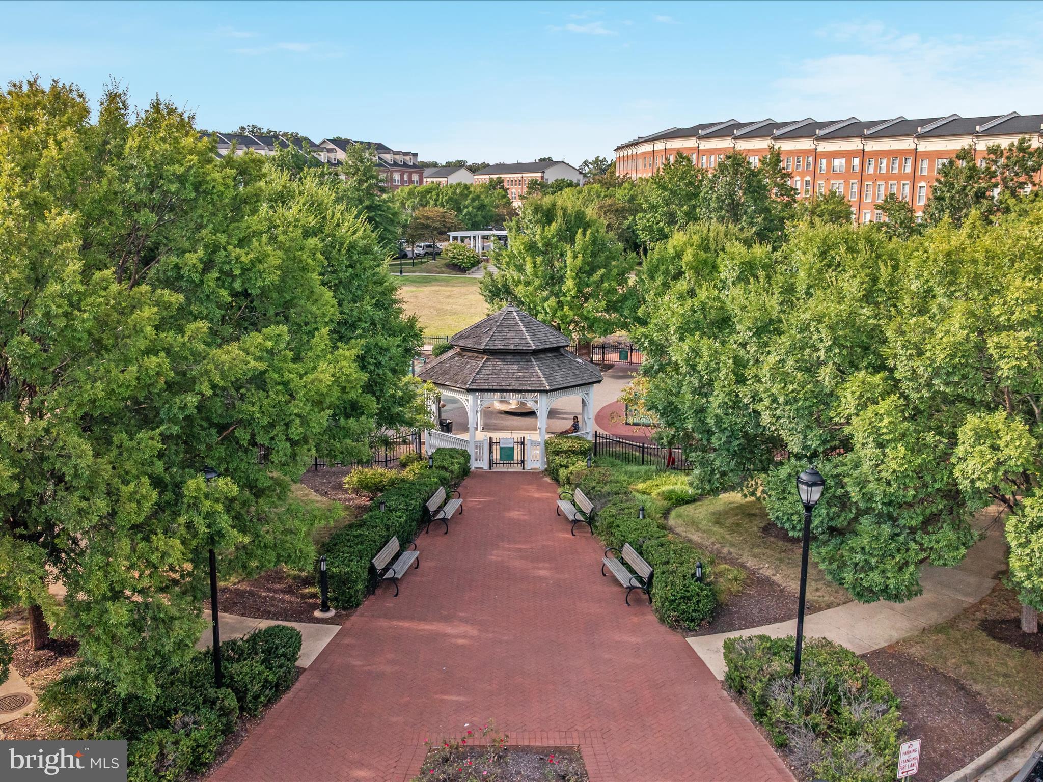 7734 Cedar Branch Drive Gainesville, VA 20155 - Photo 52 of 62 a view of a pathway in front of a building