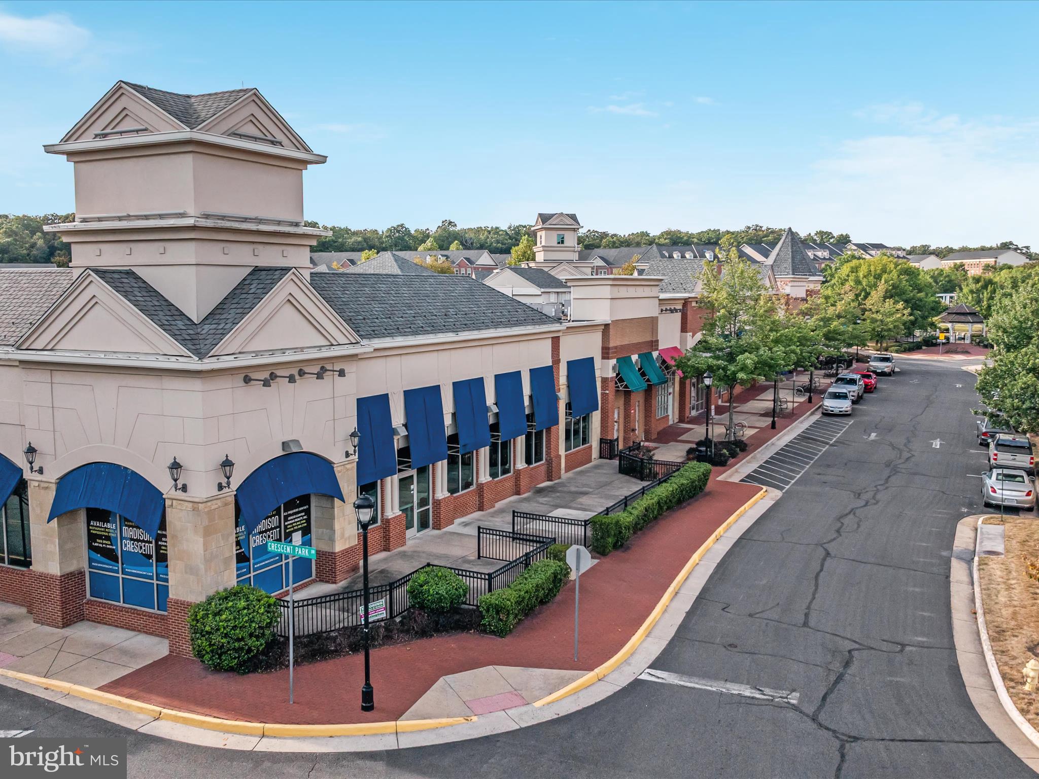7734 Cedar Branch Drive Gainesville, VA 20155 - Photo 56 of 62 a view of a large building with a clock tower in front of it