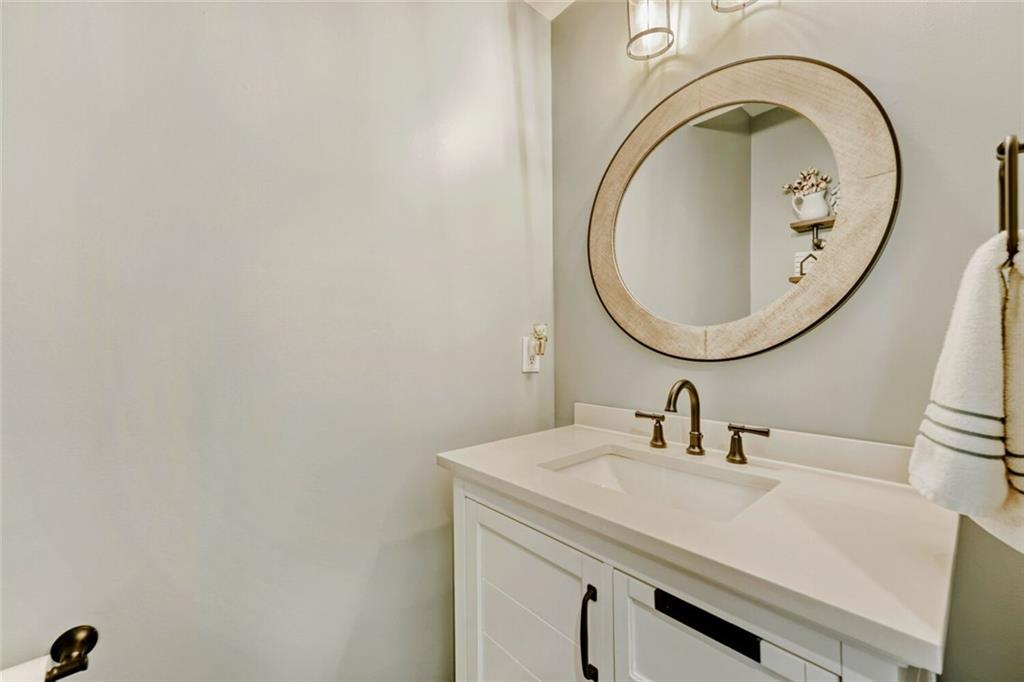 153 Bryon Lane Acworth, GA 30102 - Photo 16 of 25 a bathroom with a sink and a mirror