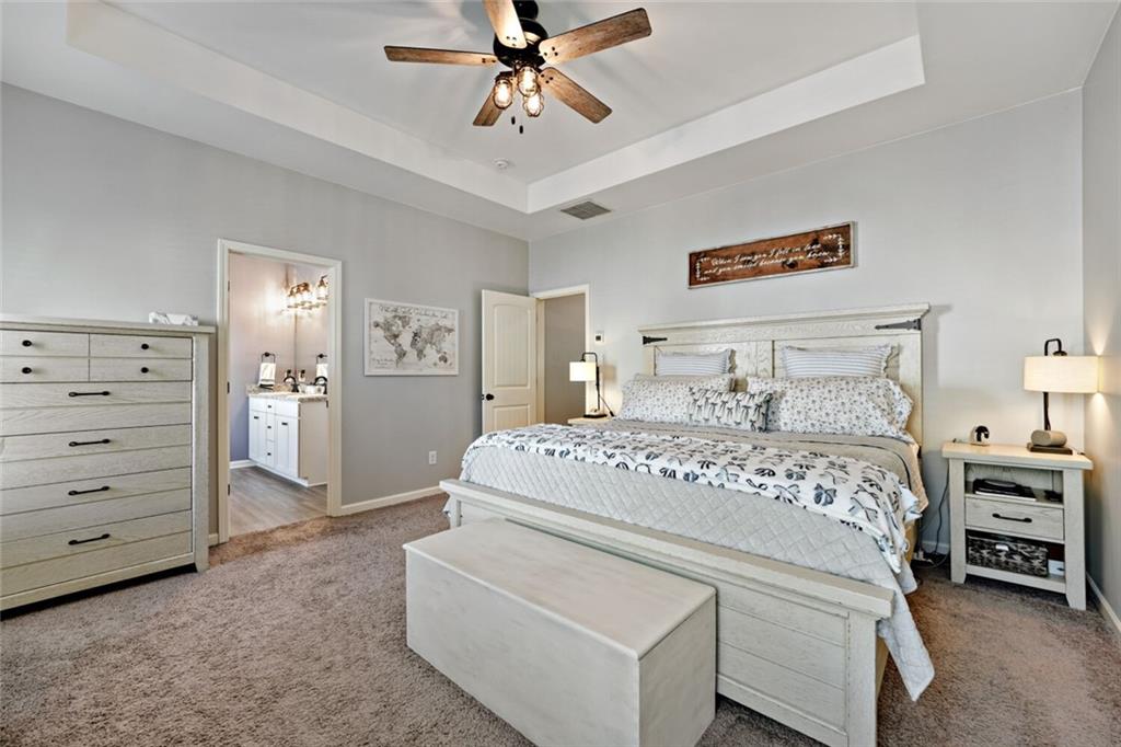 153 Bryon Lane Acworth, GA 30102 - Photo 19 of 25 a bedroom with a bed and a cabinets