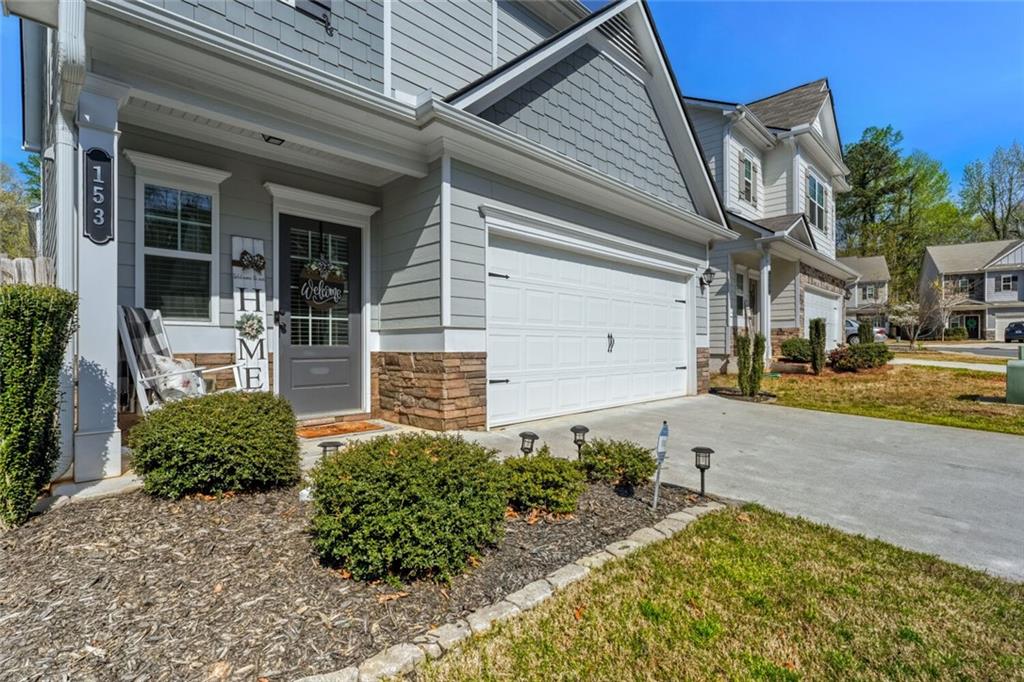 153 Bryon Lane Acworth, GA 30102 - Photo 2 of 25 a front view of a house with garden