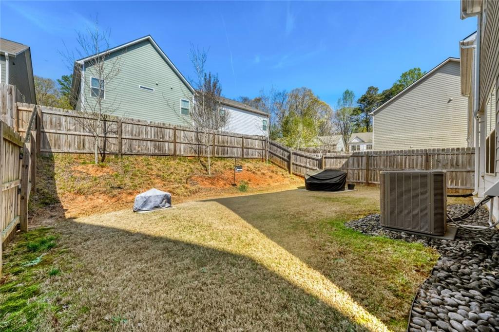 153 Bryon Lane Acworth, GA 30102 - Photo 24 of 25 a view of a house with backyard