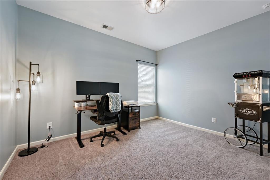153 Bryon Lane Acworth, GA 30102 - Photo 10 of 25 a view of a workspace with furniture