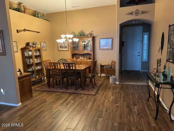 a kitchen with stainless steel appliances a sink stove and cabinets