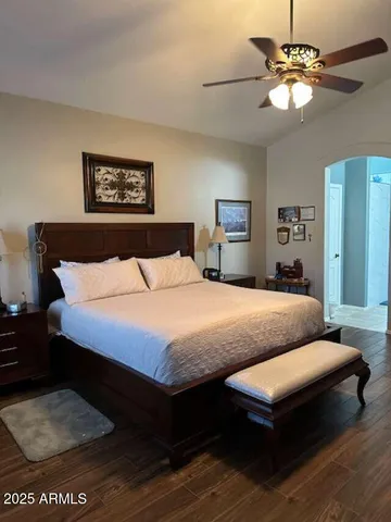 a bathroom with a shower and a toilet