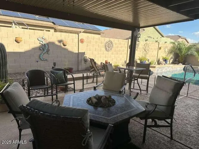 a view of a dinning tables and chairs in porch