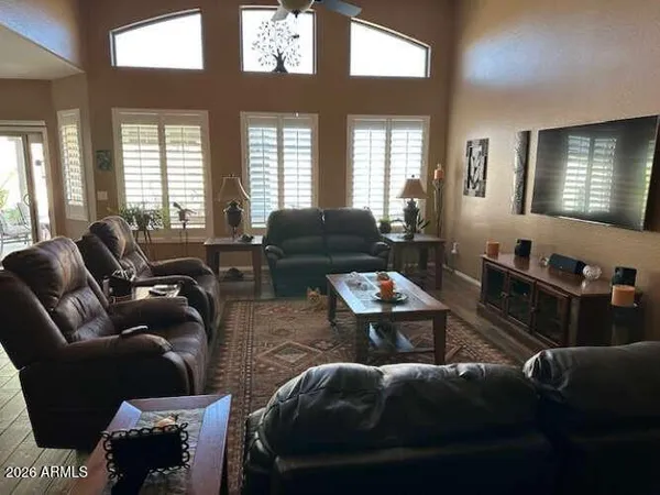a living room with furniture and a window