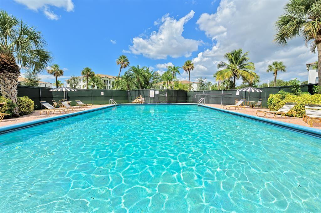 9355 Southwest 8th Street, Unit 401 Boca Raton, FL 33428 - Photo 15 of 37 a view of a garden