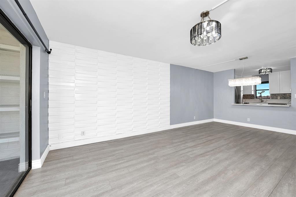 9355 Southwest 8th Street, Unit 401 Boca Raton, FL 33428 - Photo 29 of 37 a view of a livingroom with wooden floor