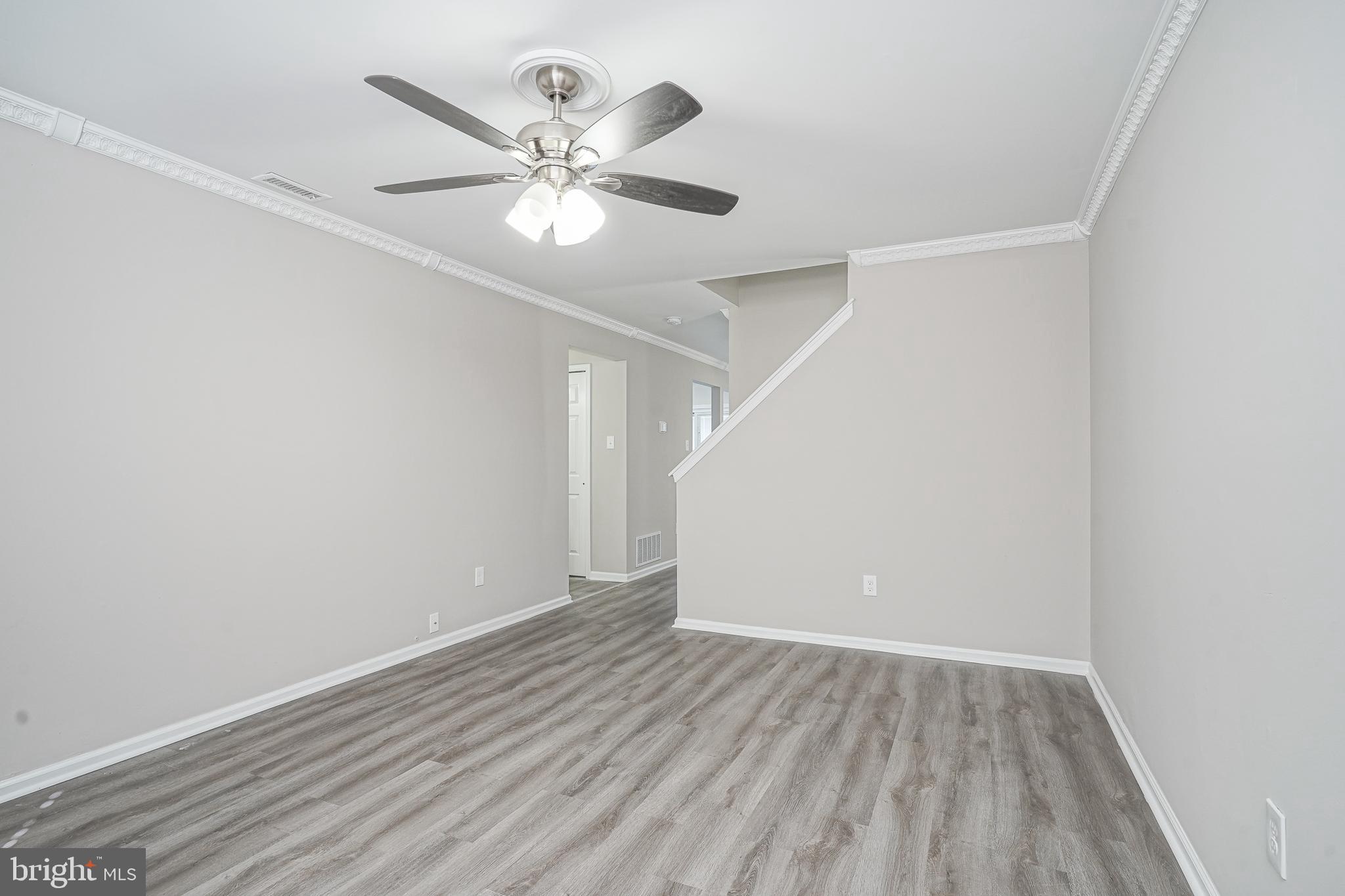 3002 Tall Pines Pine Hill, NJ 08021 - Photo 18 of 29 a view of a room with wooden floor and a ceiling fan