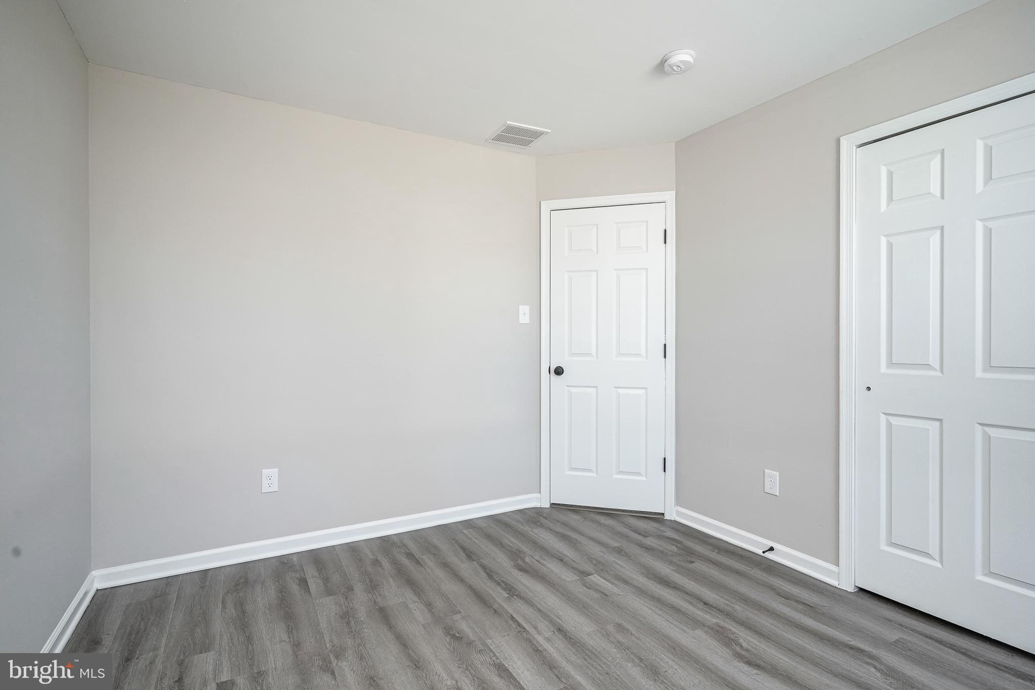 3002 Tall Pines Pine Hill, NJ 08021 - Photo 19 of 29 a view of an empty room with wooden floor