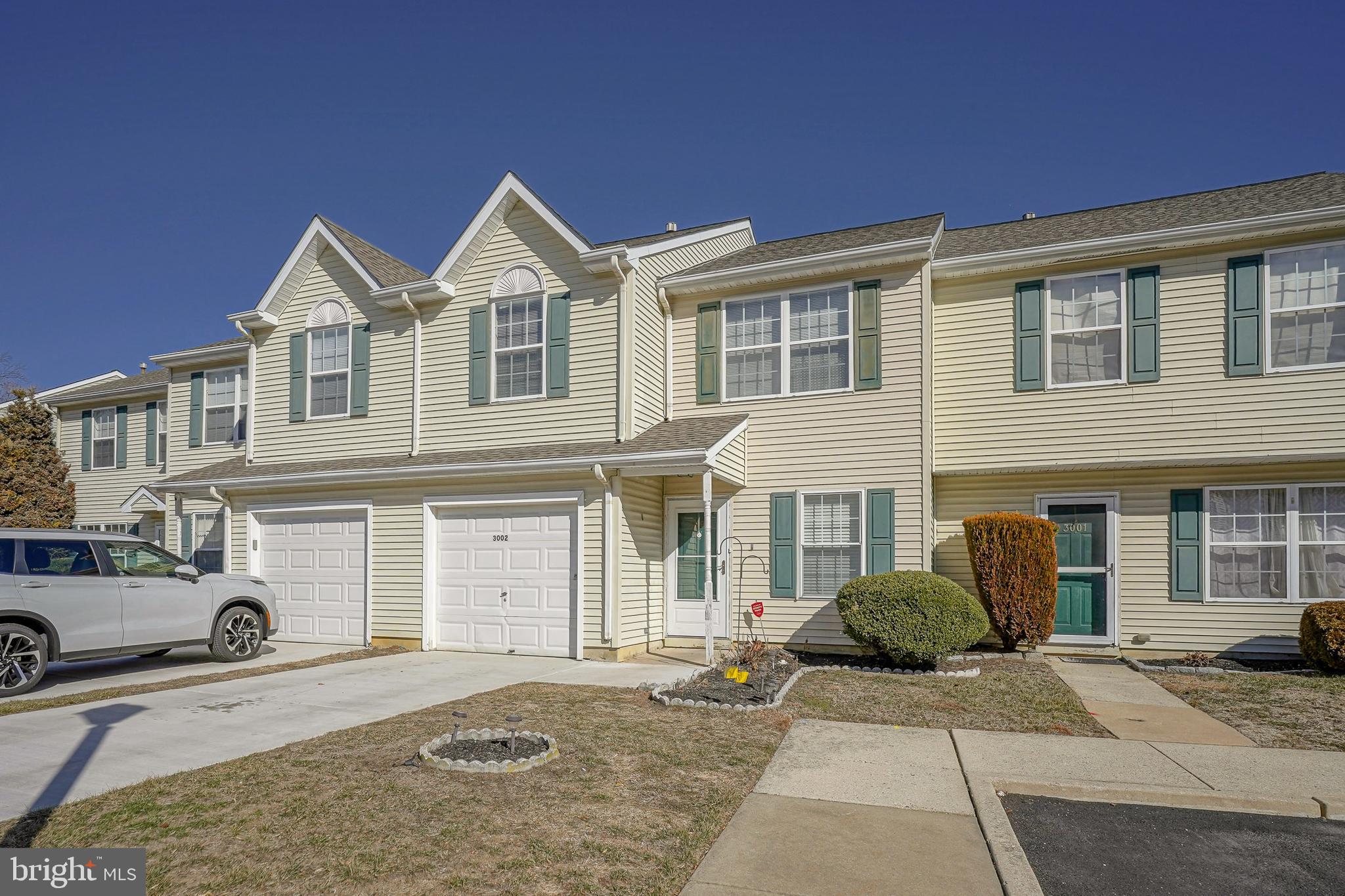 3002 Tall Pines Pine Hill, NJ 08021 - Photo 2 of 29 a front view of a house with a yard