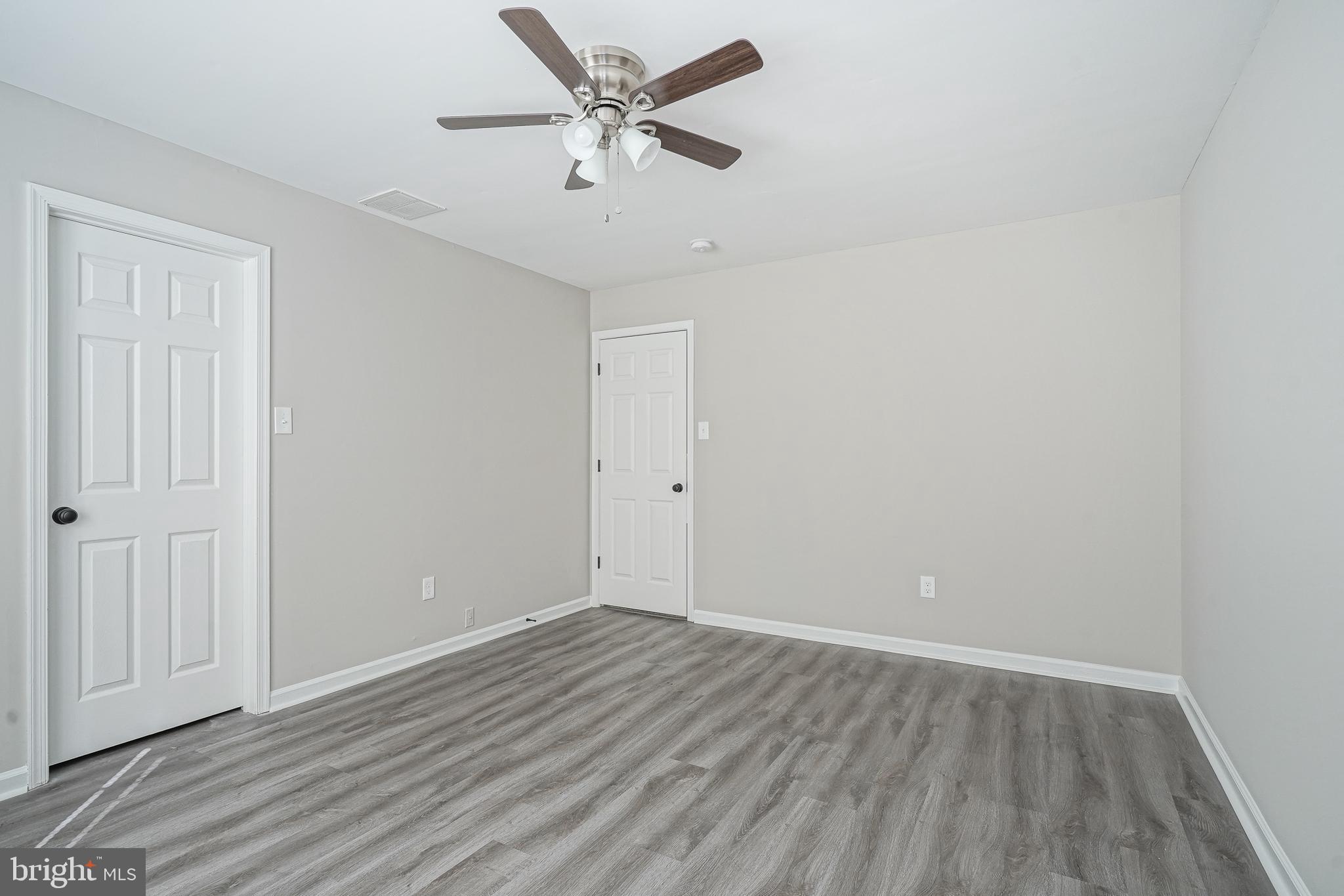 3002 Tall Pines Pine Hill, NJ 08021 - Photo 22 of 29 a view of an empty room with wooden floor