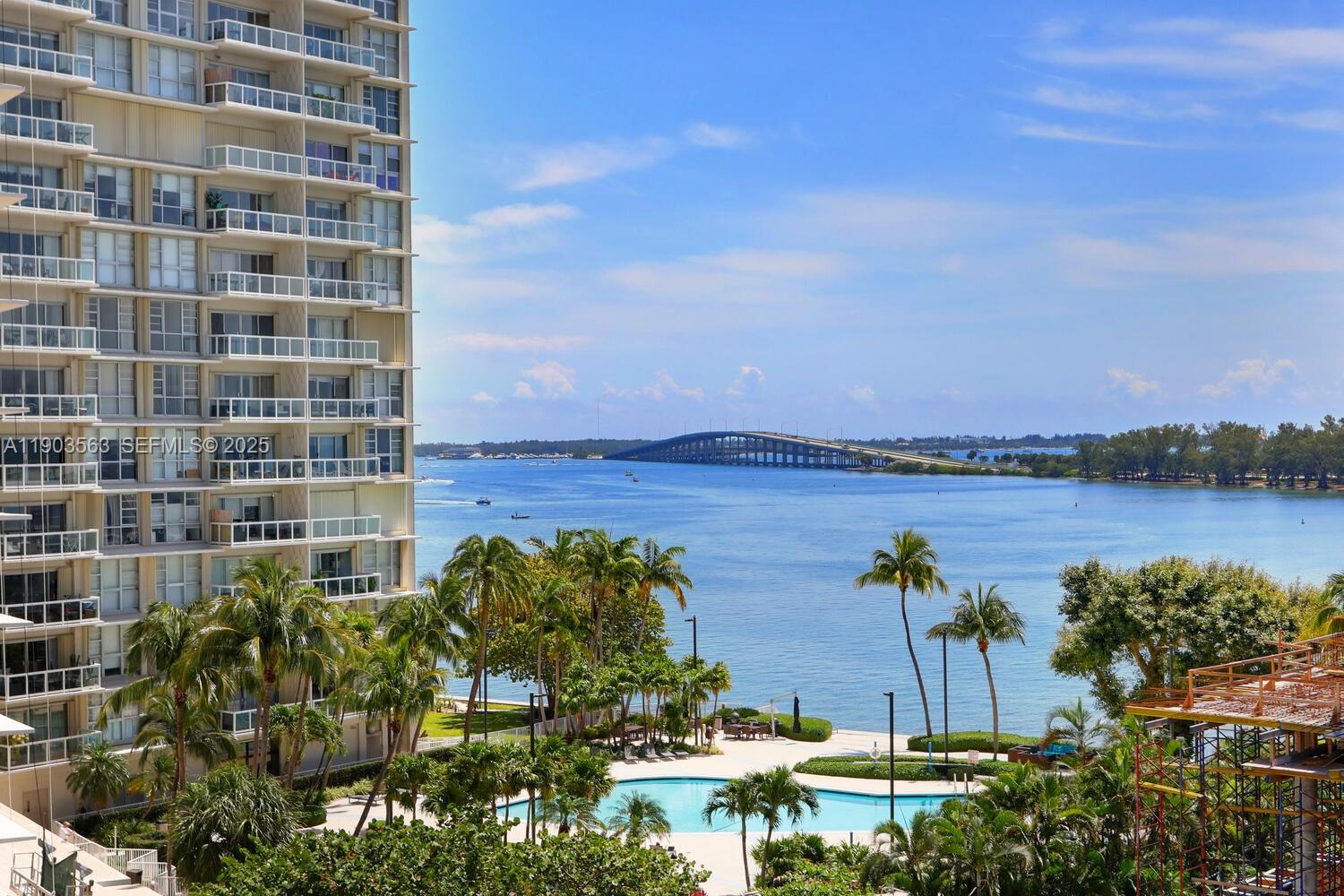 a view of a lake with a building in front of it