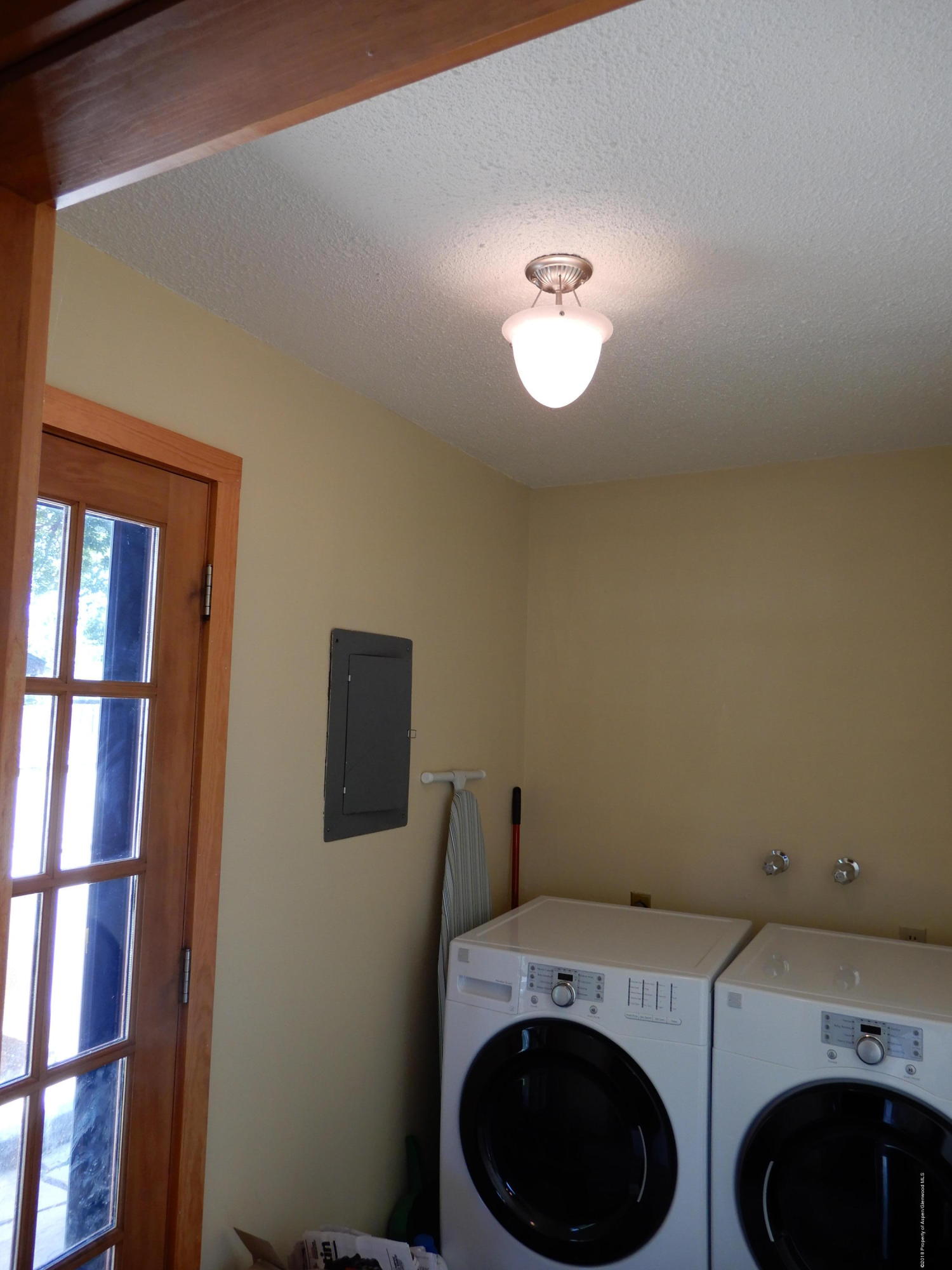 560 Will Avenue Rifle, CO 81650 - Photo 18 of 18 a view of a storage & utility room with washer and dryer