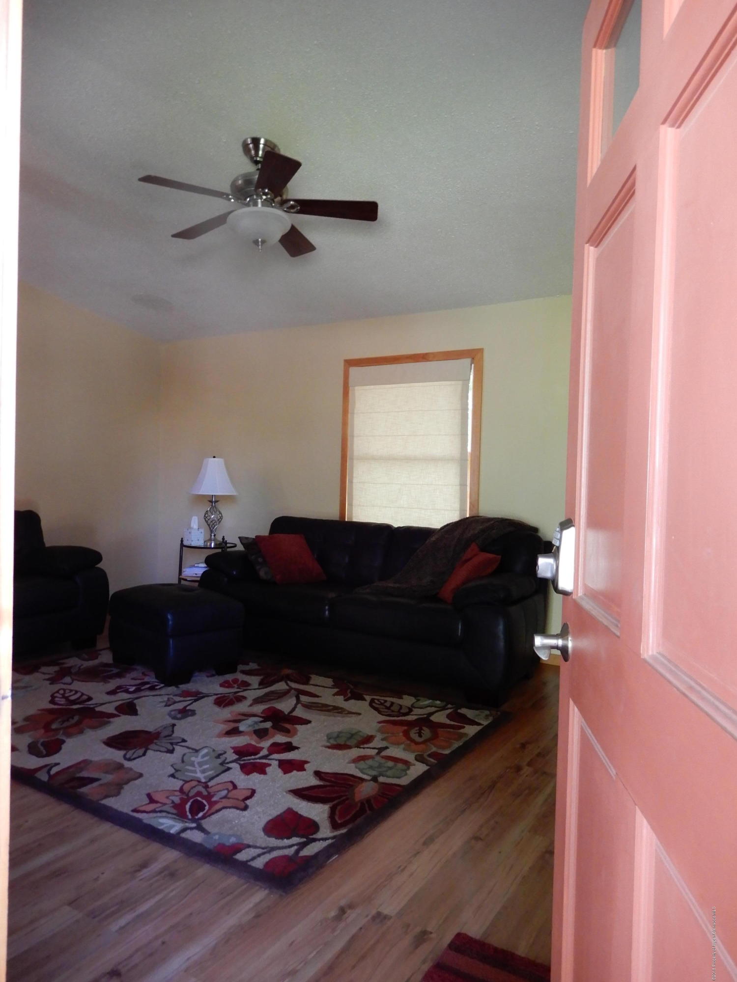 560 Will Avenue Rifle, CO 81650 - Photo 5 of 18 a living room with furniture and a window