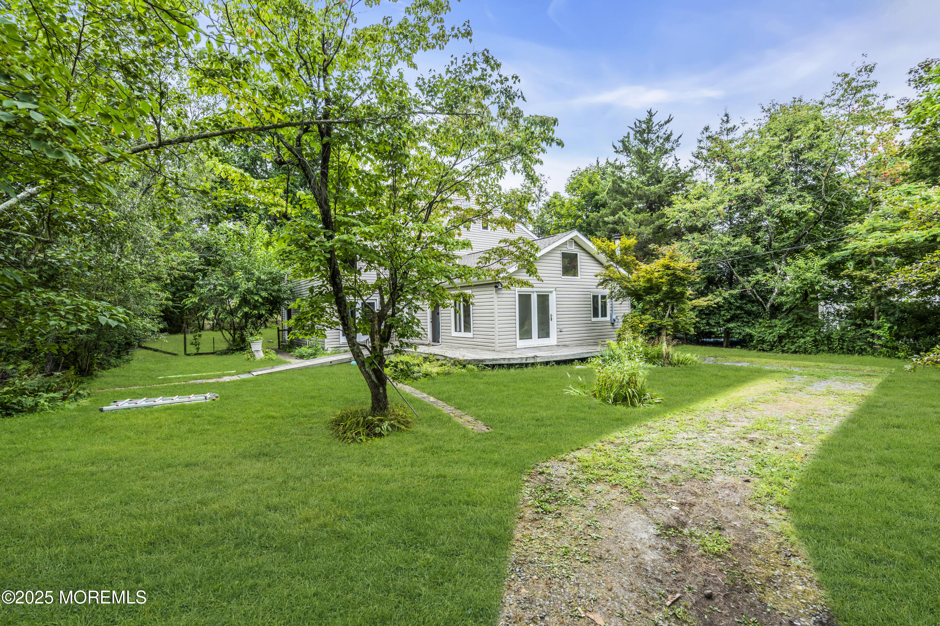 2422 Capshaw Road Forked River, NJ 08731 - Photo 54 of 55 a view of backyard of house with green space