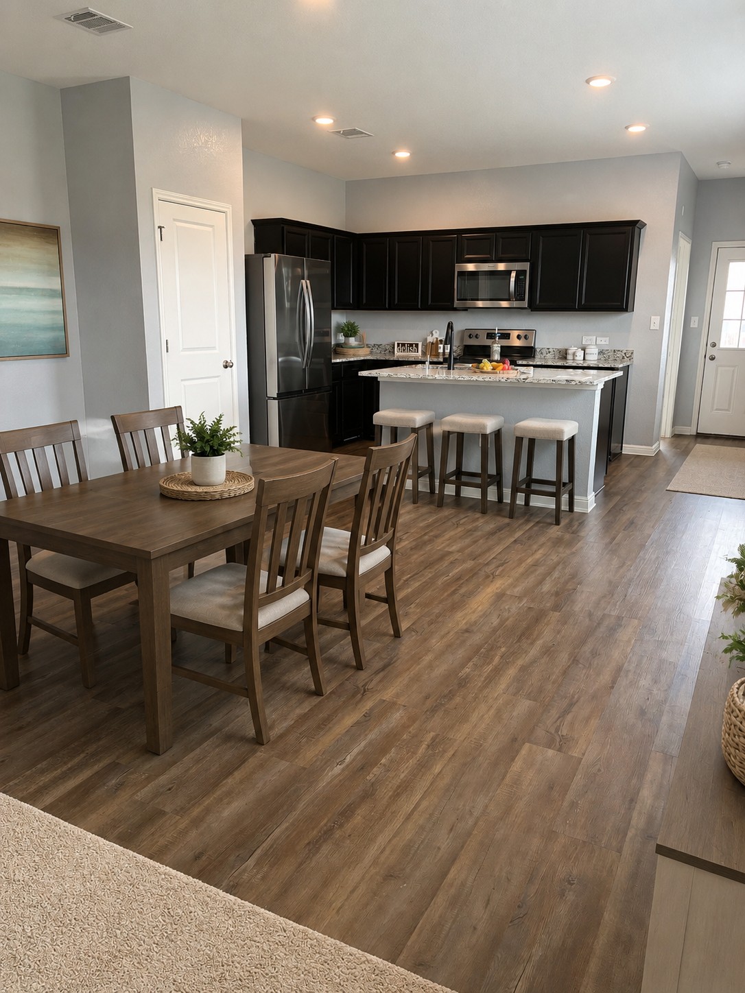 109 Helios Drive Jarrell, TX 76537 - Photo 9 of 36 a view of a dining room with furniture and wooden floor