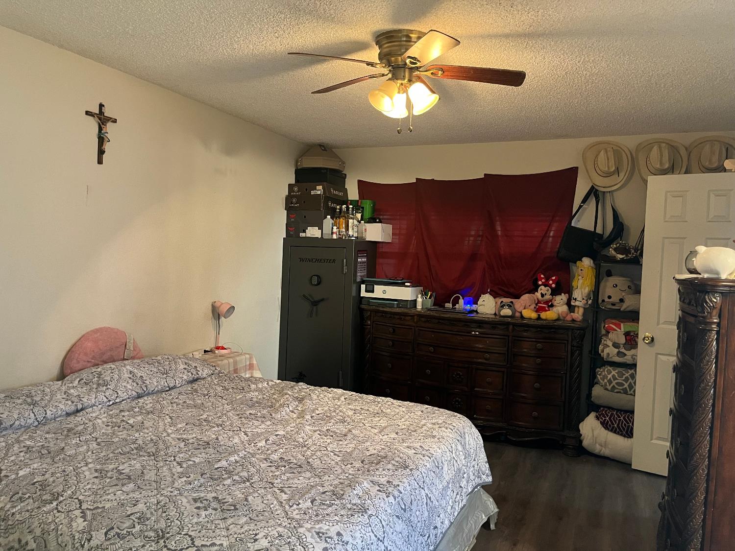 800 Wessmith Way Madera, CA 93638 - Photo 17 of 24 a bedroom with a bed and a dresser