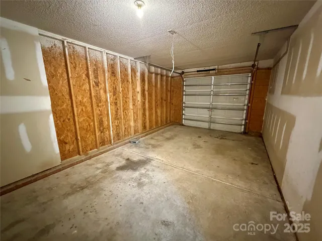 a view of a playground with basketball court