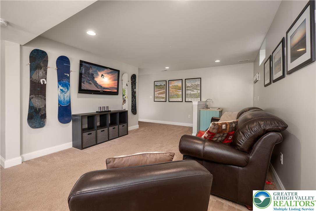 840 Texas Road Easton, PA 18042 - Photo 44 of 49 a living room with furniture and a flat screen tv
