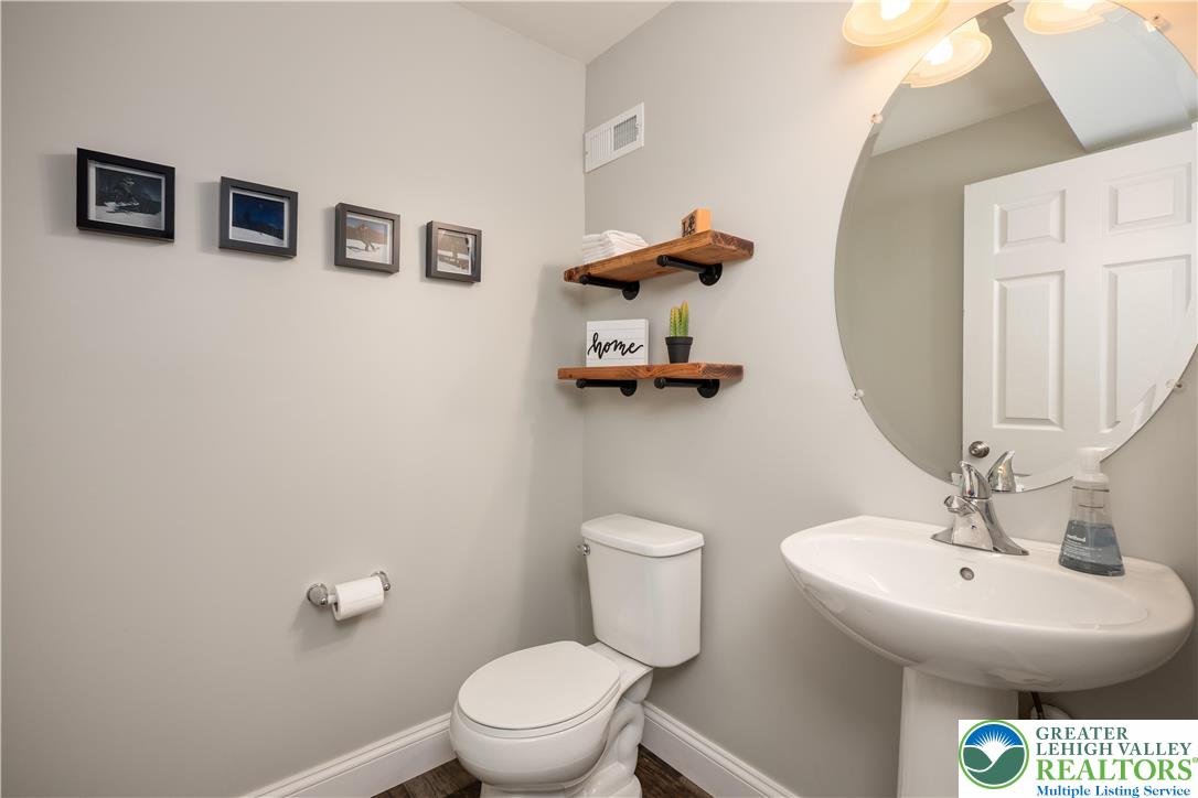 840 Texas Road Easton, PA 18042 - Photo 47 of 49 a bathroom with a toilet sink and mirror