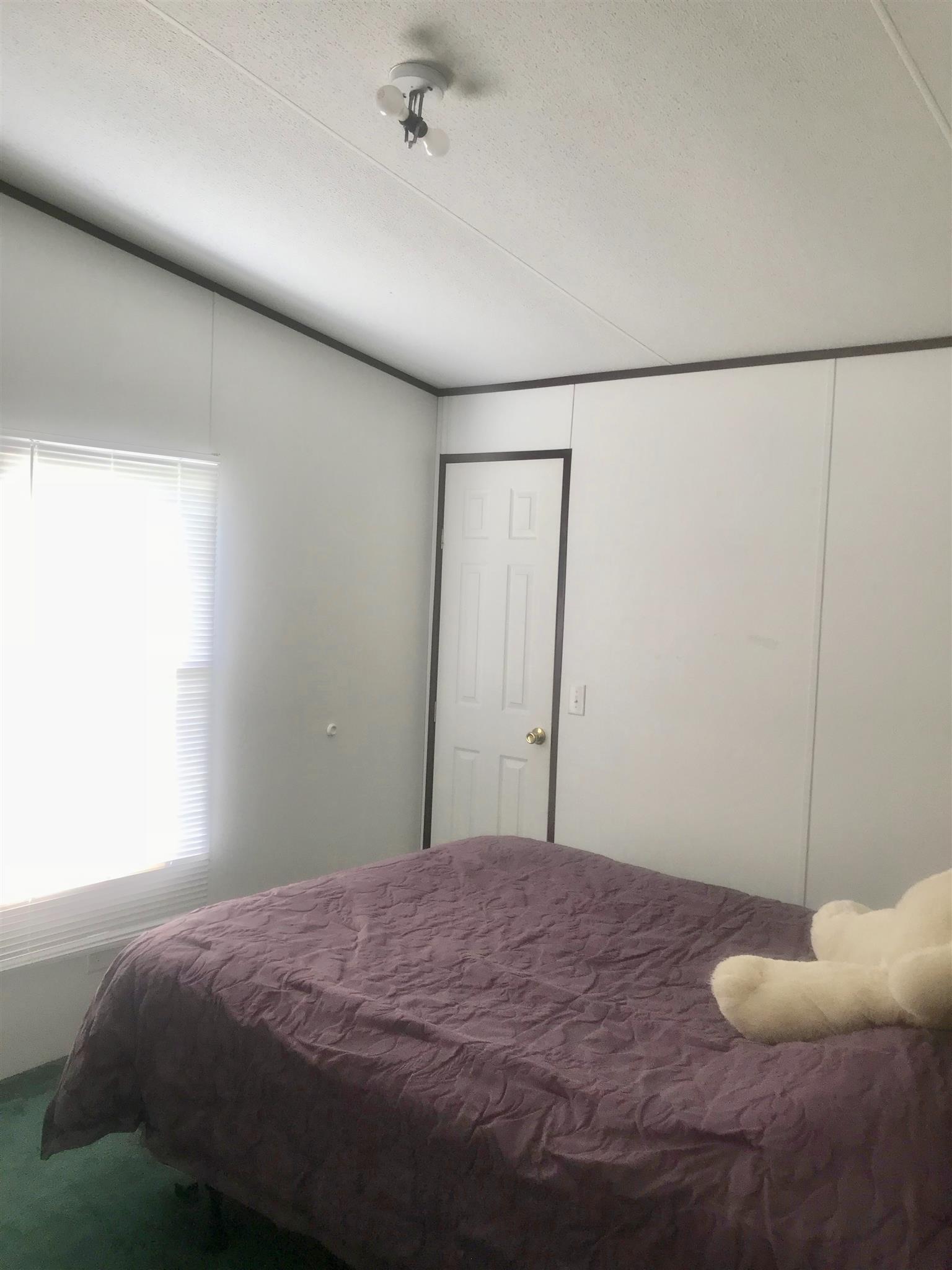 7596 Franklin Road Mount Juliet, TN 37122 - Photo 16 of 16 a bedroom with a bed and a window