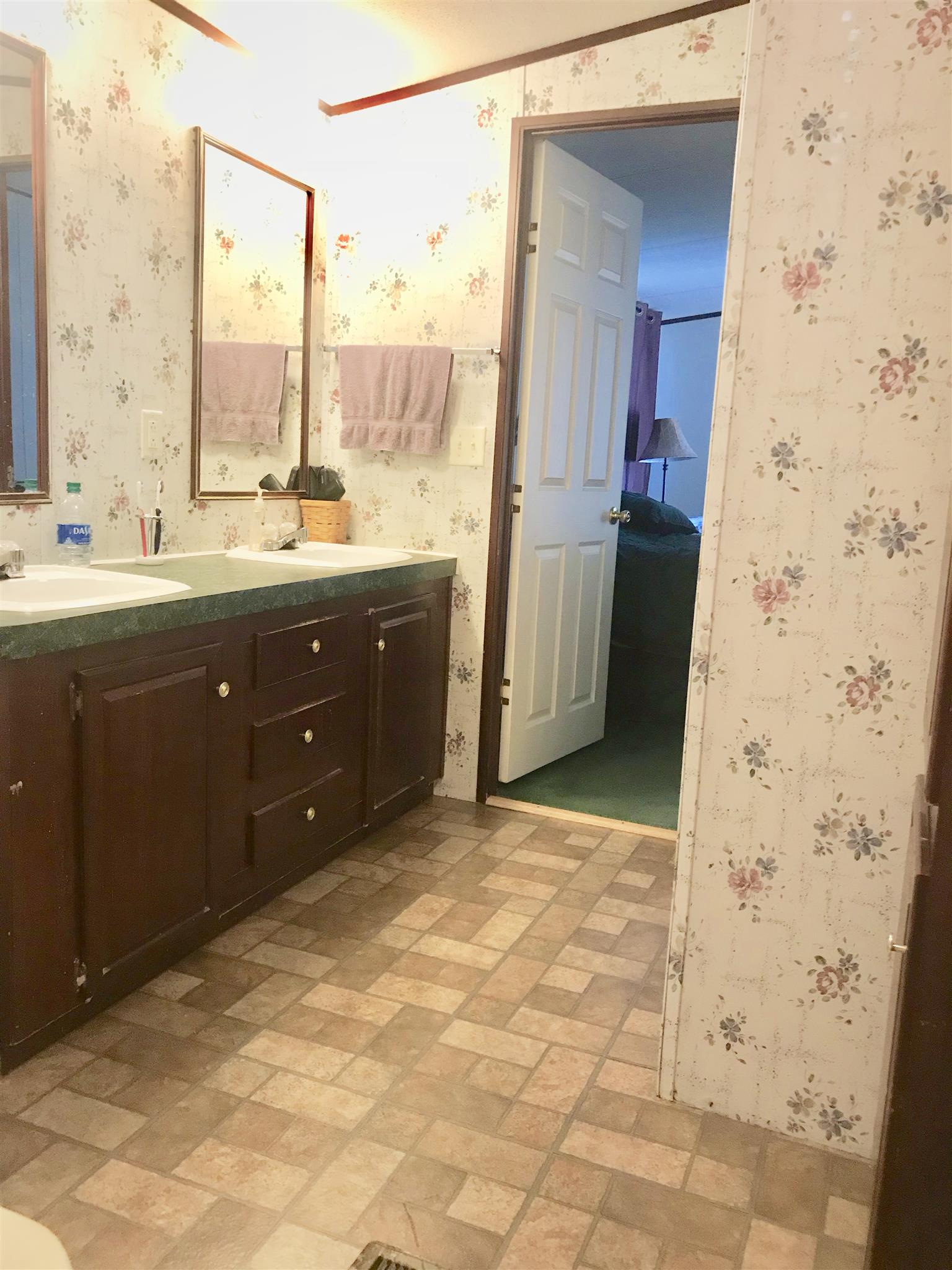 7596 Franklin Road Mount Juliet, TN 37122 - Photo 9 of 16 a bathroom with a sink and a mirror