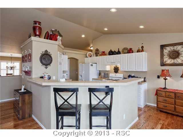 12009 Rio Secco Road Peyton, CO 80831 - Photo 9 of 24 Bar Area off kitchen counter for extra seating