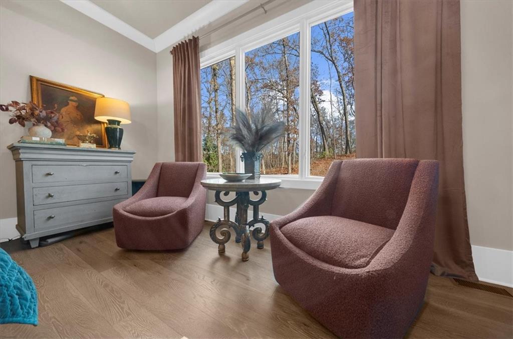 9773 Hightower Road Roswell, GA 30075 - Photo 34 of 79 a living room with furniture and a window