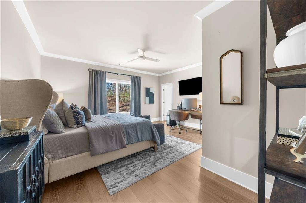 9773 Hightower Road Roswell, GA 30075 - Photo 53 of 79 a living room with a bed furniture and a window
