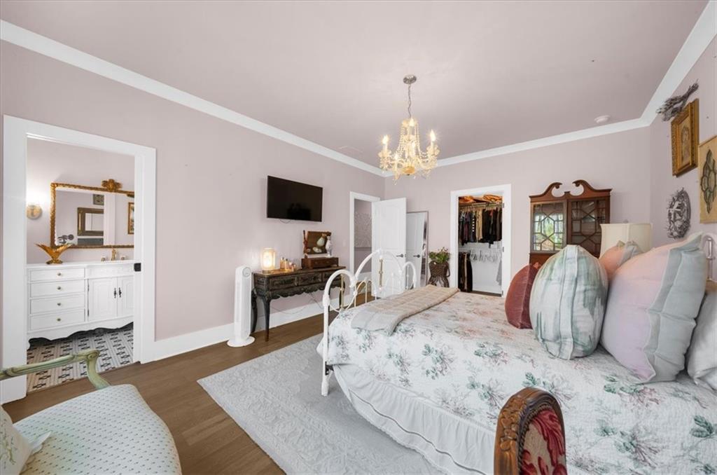 9773 Hightower Road Roswell, GA 30075 - Photo 59 of 79 a living room with furniture a dining table and a chandelier