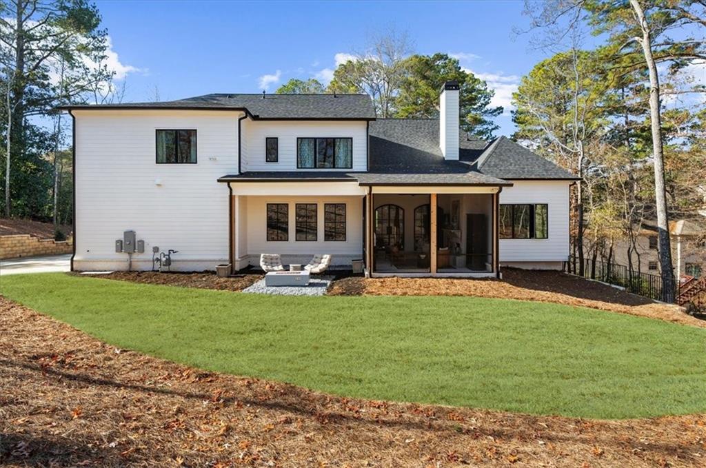 9773 Hightower Road Roswell, GA 30075 - Photo 64 of 79 front view of a house with a yard