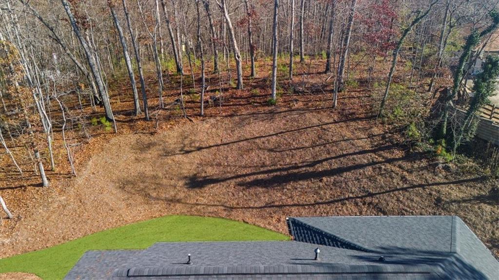 9773 Hightower Road Roswell, GA 30075 - Photo 71 of 79 a view of backyard with wooden fence