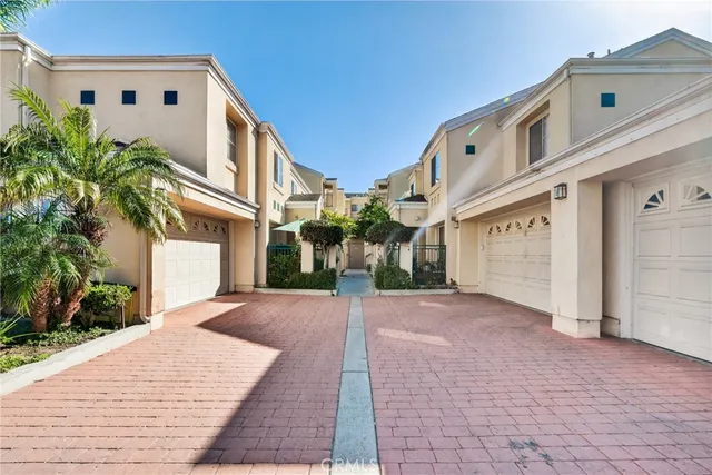 a view of a building with a yard