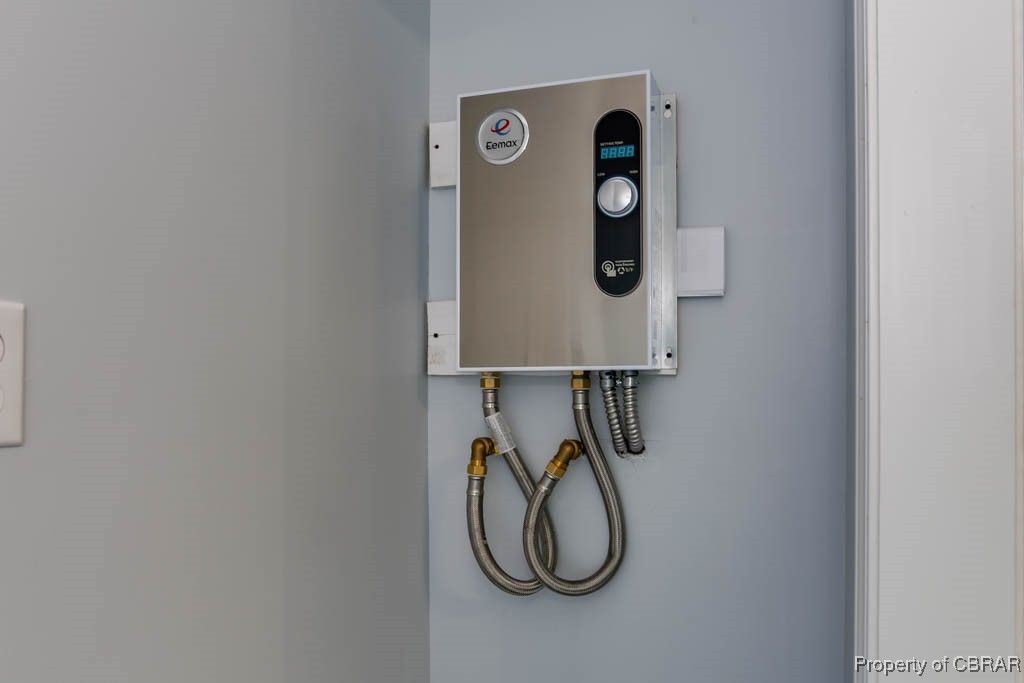 917 Chapel Neck Road North, VA 23128 - Photo 20 of 29 Detailed view of tankless water heater