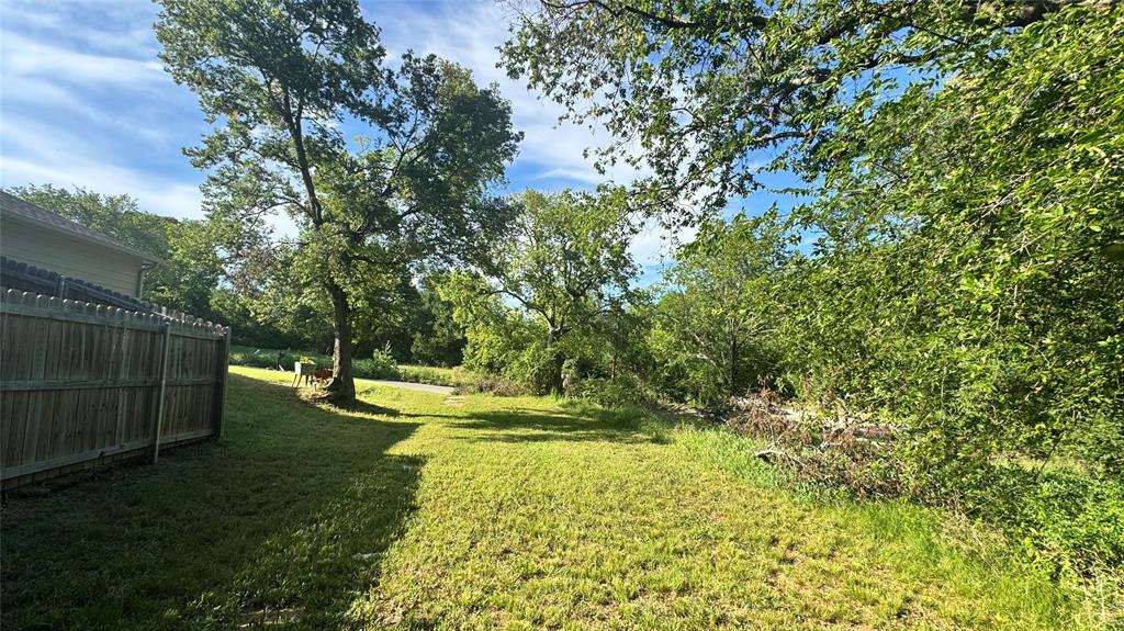 0 East Nelson Street Denison, TX 75021 - Photo 14 of 28 a view of yard with green space