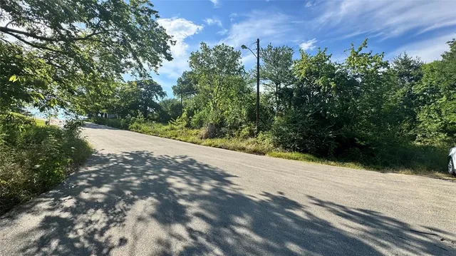 a view of a backyard of a house