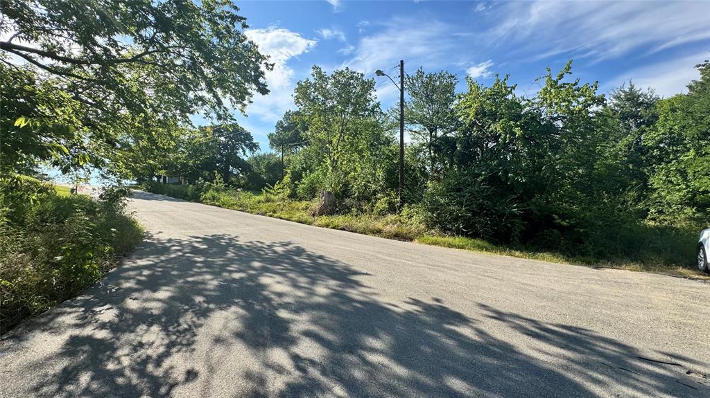 0 East Nelson Street Denison, TX 75021 - Photo 4 of 28 a view of a backyard of a house